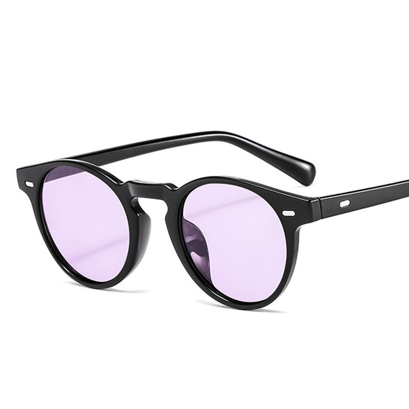 "Lunettes de soleil rondes rétro au style classique et élégant, parfaites pour un look vintage avec des verres tendance et une monture confortable."