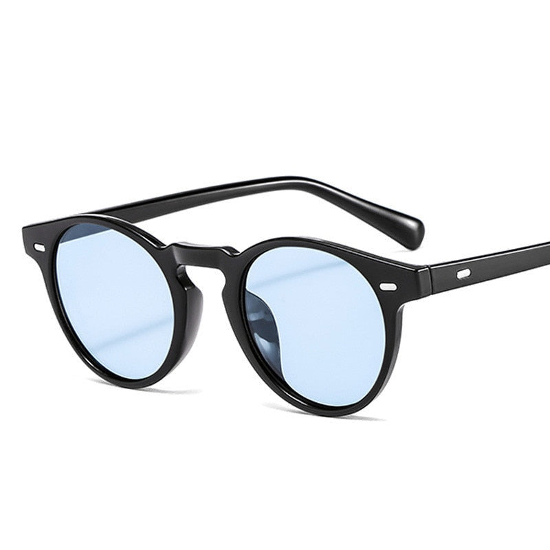 "Lunettes de soleil rondes rétro au style classique et élégant, parfaites pour un look vintage avec des verres tendance et une monture confortable."